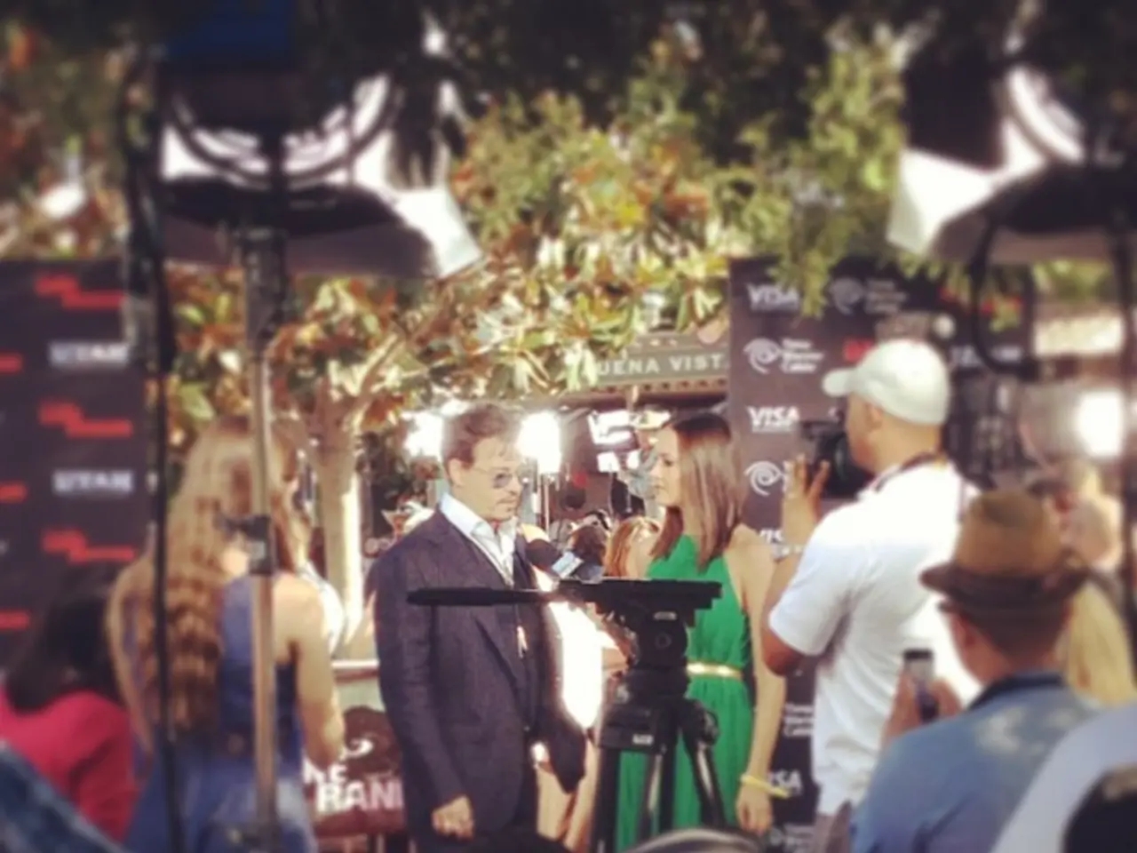 Here in this picture in the middle we can see a man and a woman standing over a place and we can...