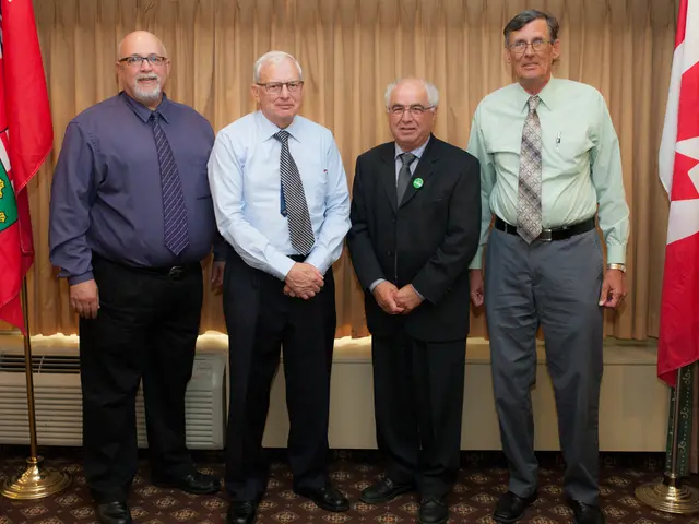In the foreground of this image, there are five men standing on the carpet having two flags on...